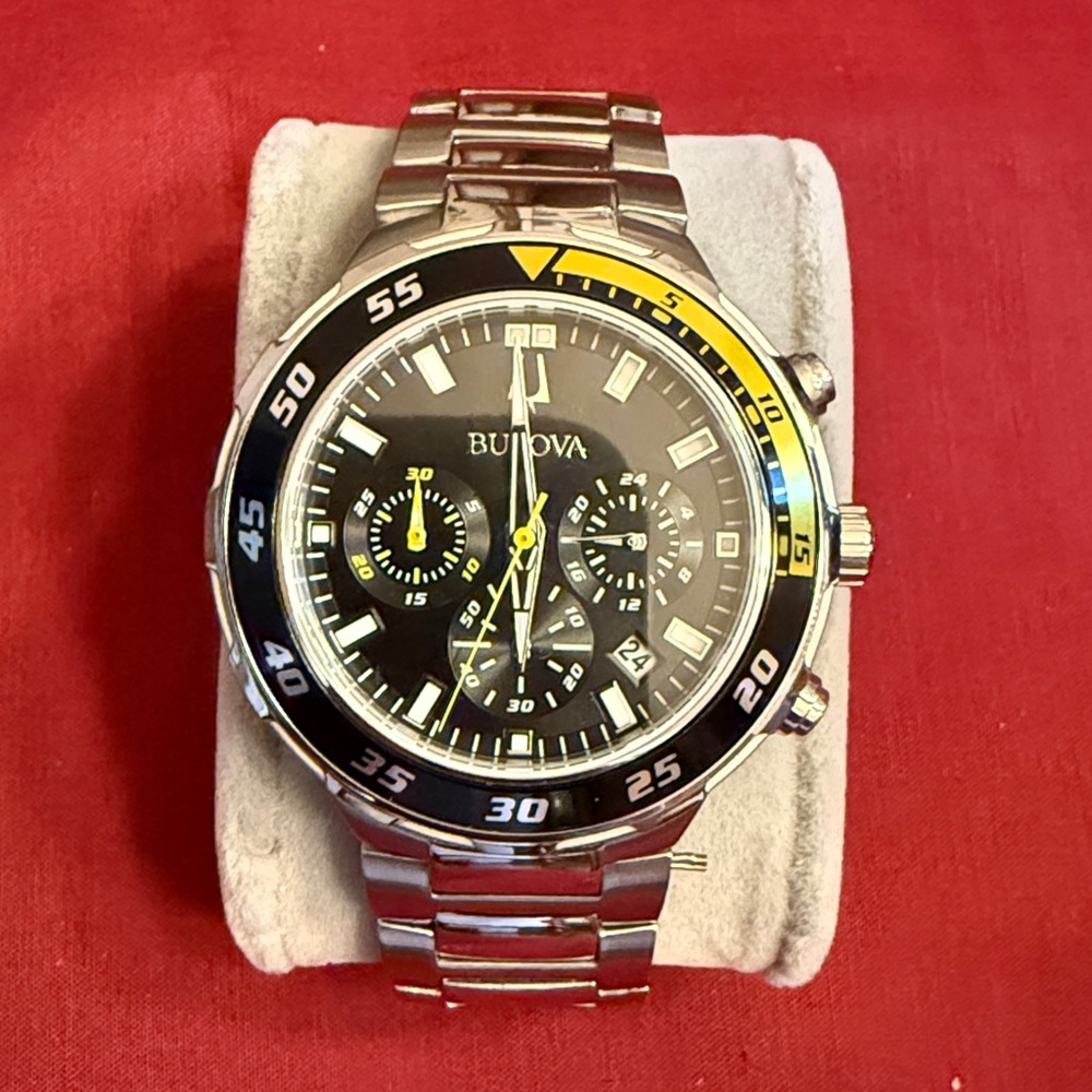 Bulova Silver Watch with Black Dial and Yellow Accent